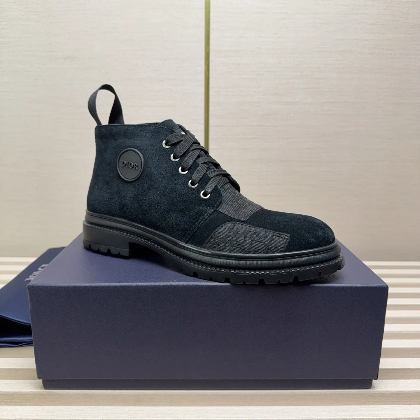 Men's Shoes 💰440 Dior A practical choice that combines protection with classic style. Made from durable Rugged Calf leather, it's tumbled and hand-finished to create a soft suede feel with a rich texture. Elastic side panels and subtle cutouts are inspired by the classic Chelsea boot. Leather upper and lining with Kummel tabs at front and rear, rubber outsole